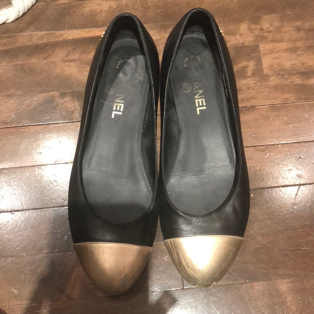 Chanel black and gold flats